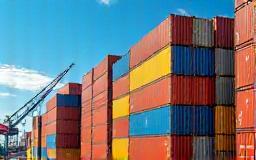 Shipping containers stacked at a port